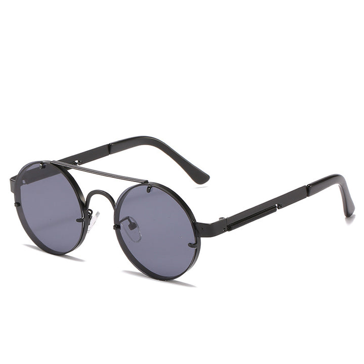 Dame rund designer solbrille med innovativ metallramme og beskyttende linser Luvikno