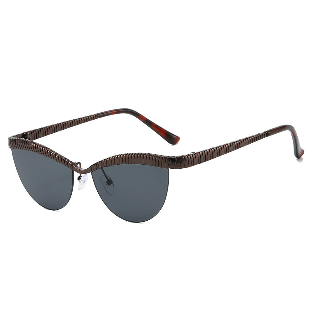 Dame Designer solbrille med unikt, bølget ramme Luvikno