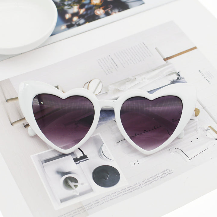 Dame hjerteformet solbrille med glitrende ramme Luvikno