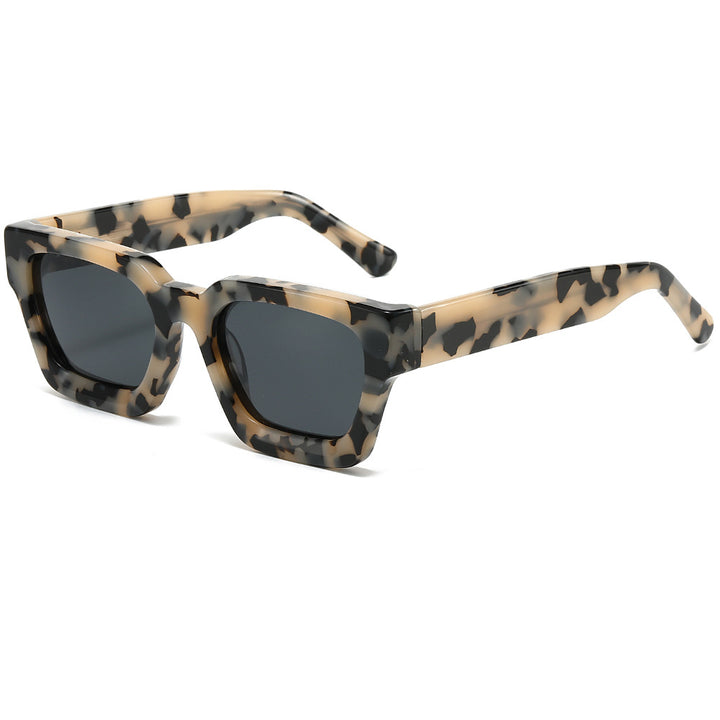 Dame designer solbrille med moderne, kvadratisk ramme og UV-beskyttelse Luvikno