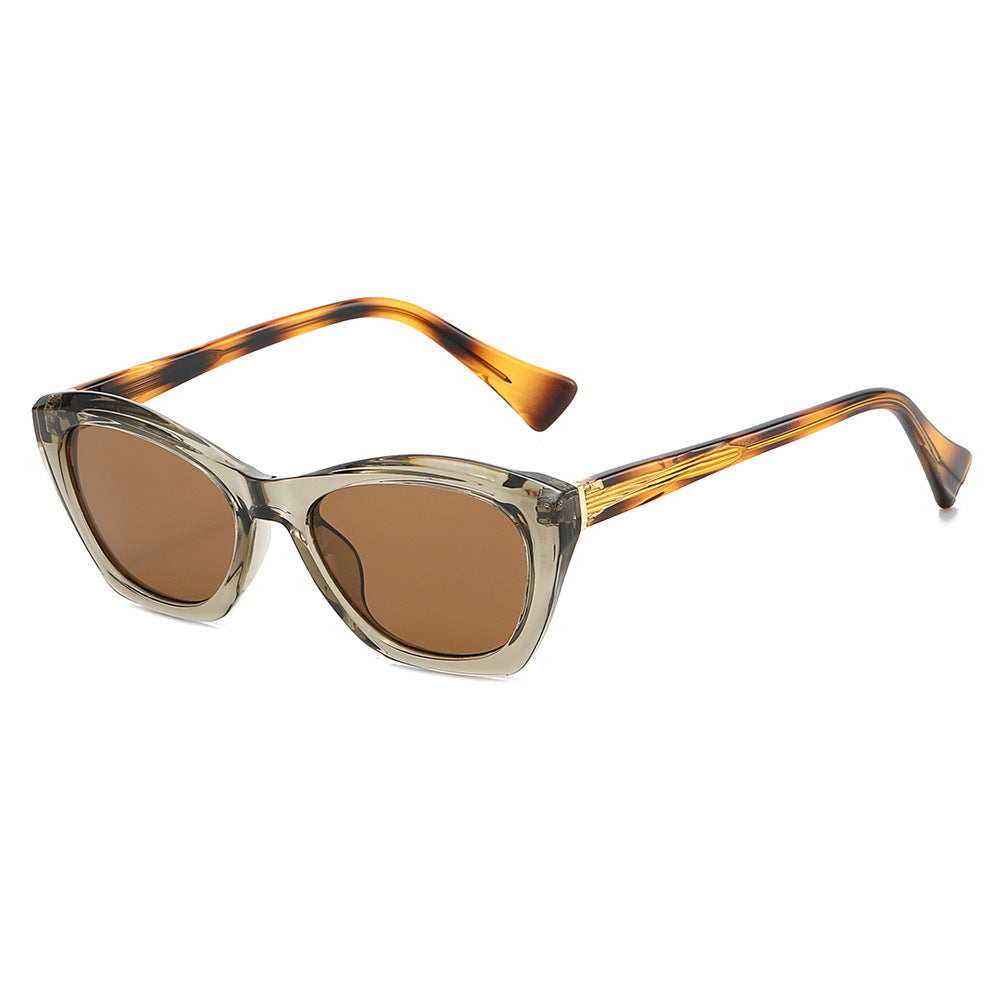 Dame Cat-Eye solbriller med transparente og fargede detaljer Luvikno