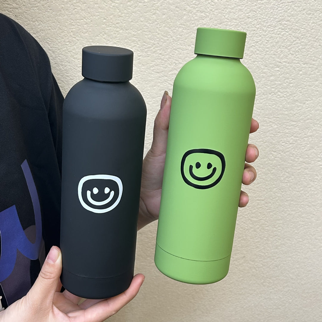 Dame isolasjonsflaske med glad smiley-design Luvikno