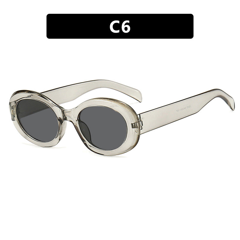 Dame moteriktig solbrille i original oval design med transparent ramme og UV-beskyttelse Luvikno