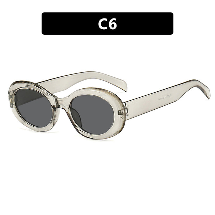Dame moteriktig solbrille i original oval design med transparent ramme og UV-beskyttelse Luvikno