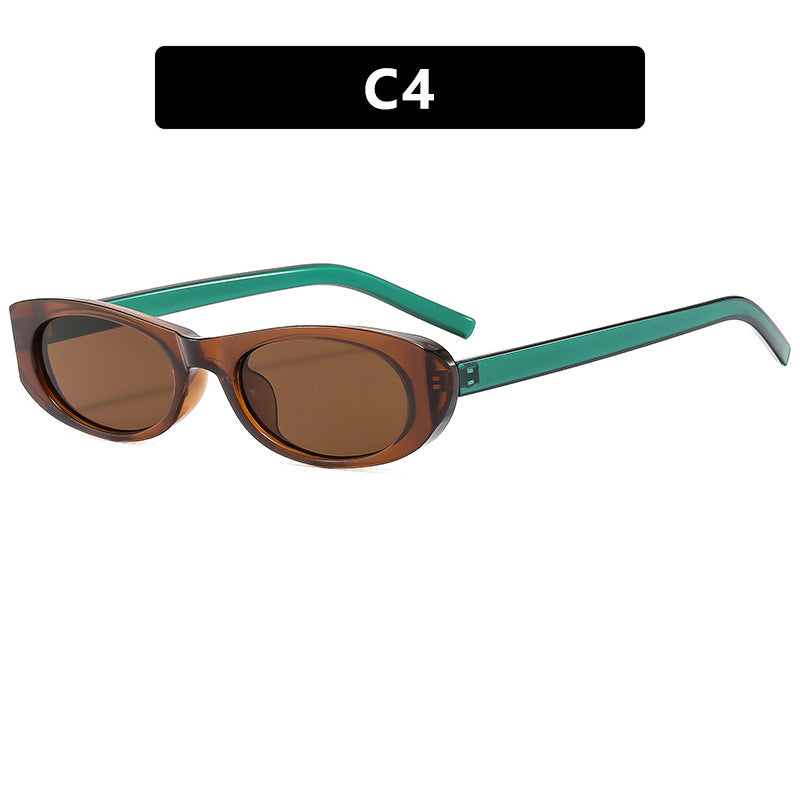 Dame moteriktig solbrille i elegant oval ramme Luvikno