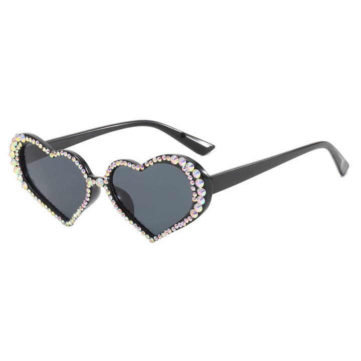 Dame hjerteformet solbrille med strassbesatt ramme Luvikno