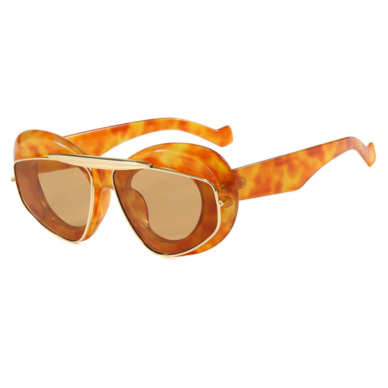 Dame futuristisk solbrille med elegant ramme Luvikno