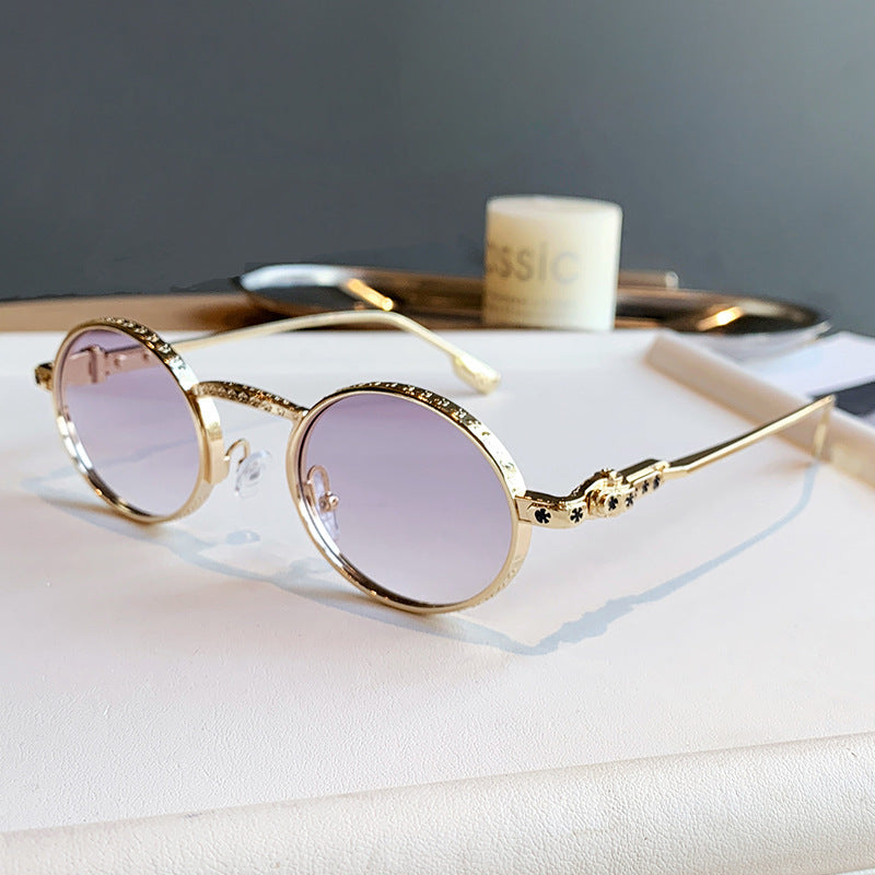 Dame Elegant solbrille med filigran detaljer Luvikno