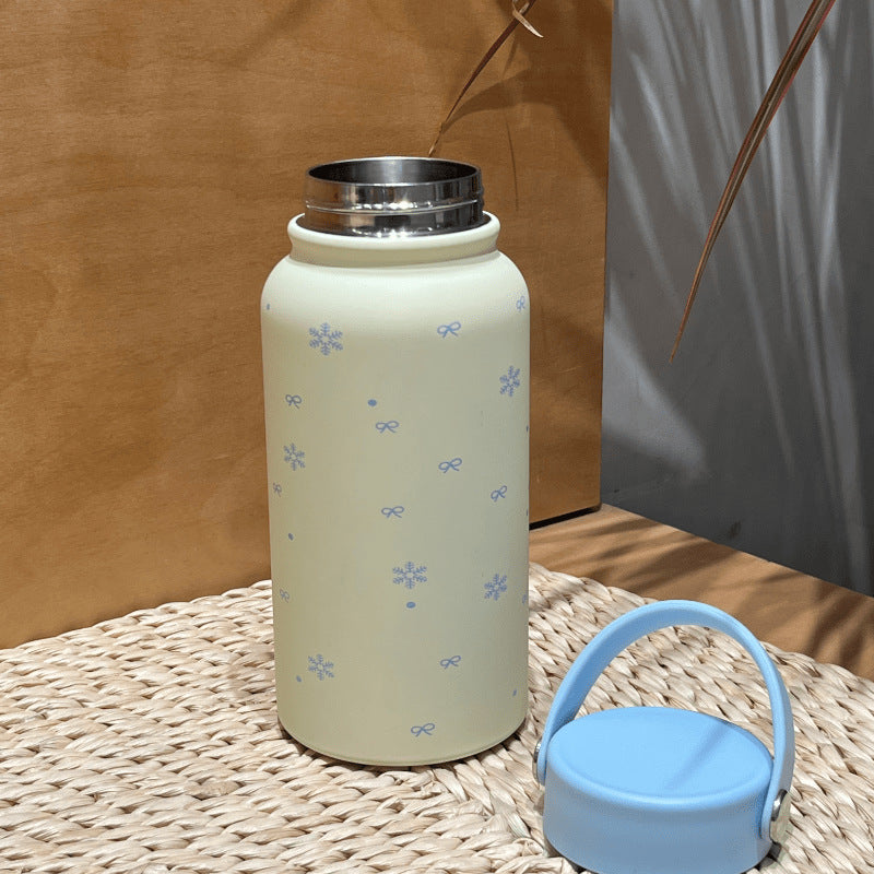 Damen Isoliertrinkflasche mit praktischem Tragegriff und fröhlichem Design Luvikno