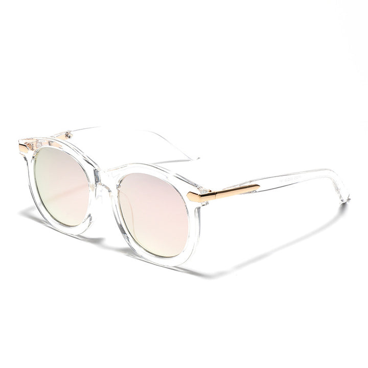 Dame moteriktig solbrille med gjennomsiktig ramme og gull accenter Luvikno