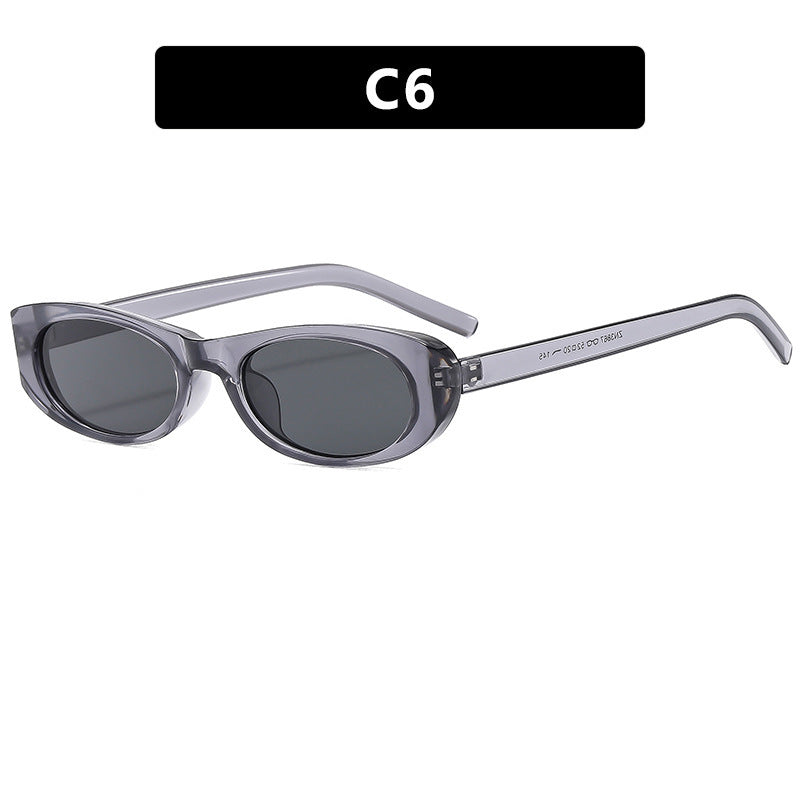 Dame moteriktig solbrille i elegant oval ramme Luvikno