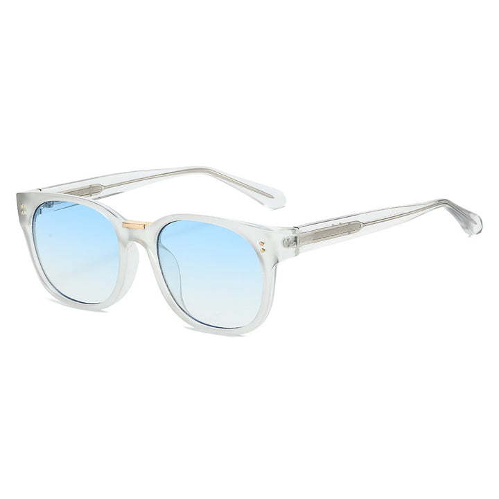 Dame moteriktig solbrille med gjennomsiktig ramme og elegante detaljer Luvikno
