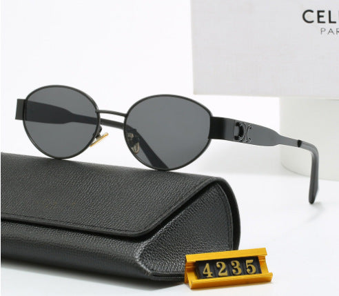 Dame elegant oval solbrille med gullfarget ramme Luvikno