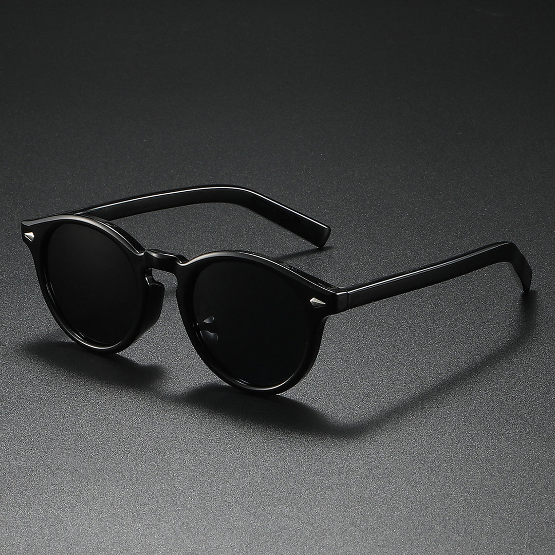 Dame Rund-solbrille med transparent ramme og reflekterende glass Luvikno