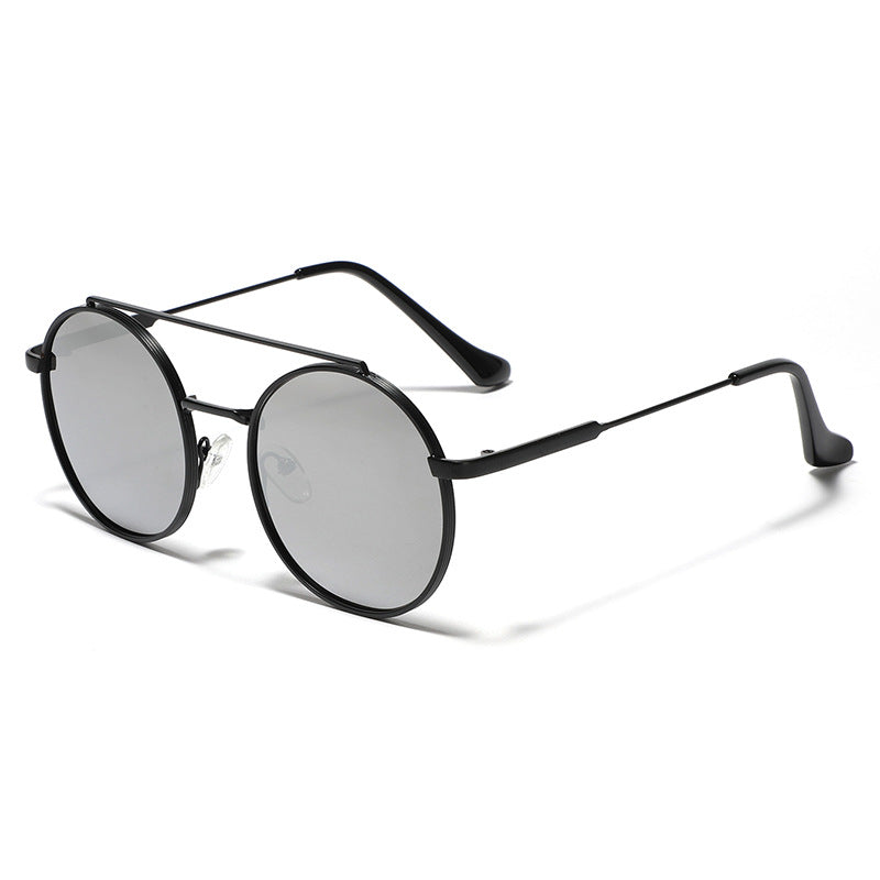 Dame rund solbrille med moteramme Luvikno