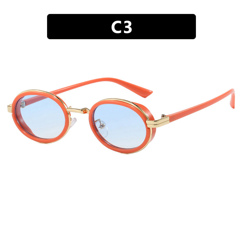 Dame rund solbrille med lette glass og gyldne detaljer Luvikno
