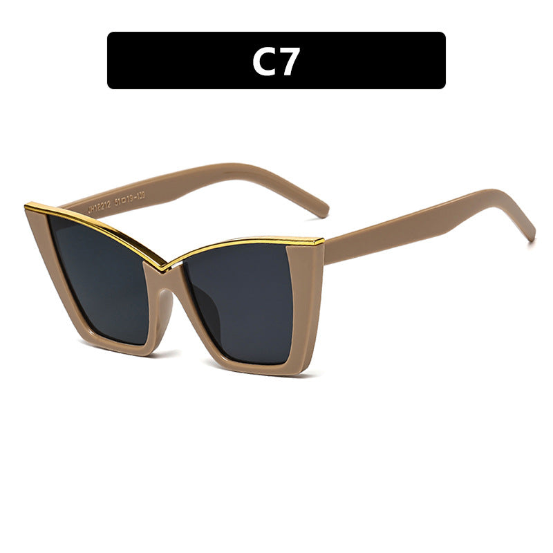 Dame ekstravagant solbrille med unik design og gullige aksenter Luvikno