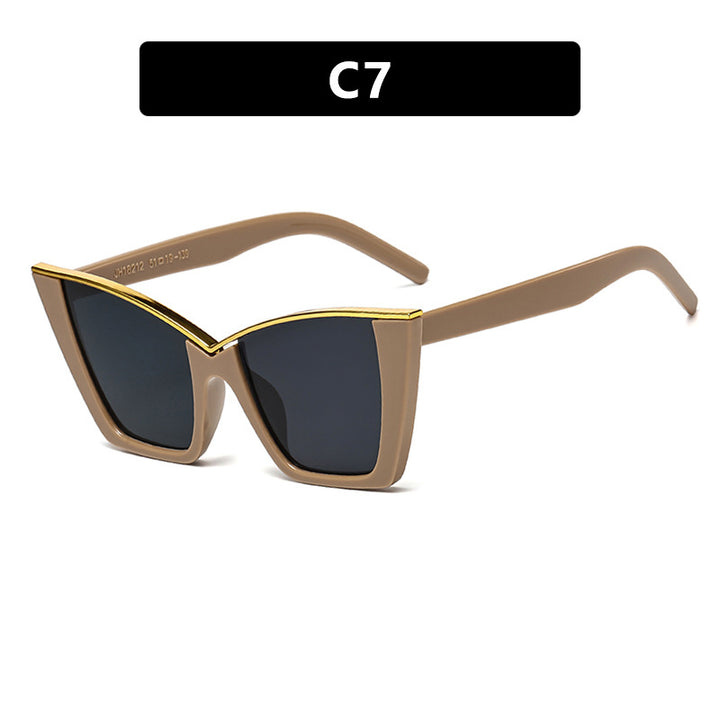 Dame ekstravagant solbrille med unik design og gullige aksenter Luvikno