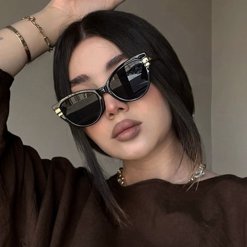 Dame Cat-Eye solbriller med elegant plastramme og gullaccentuer Luvikno