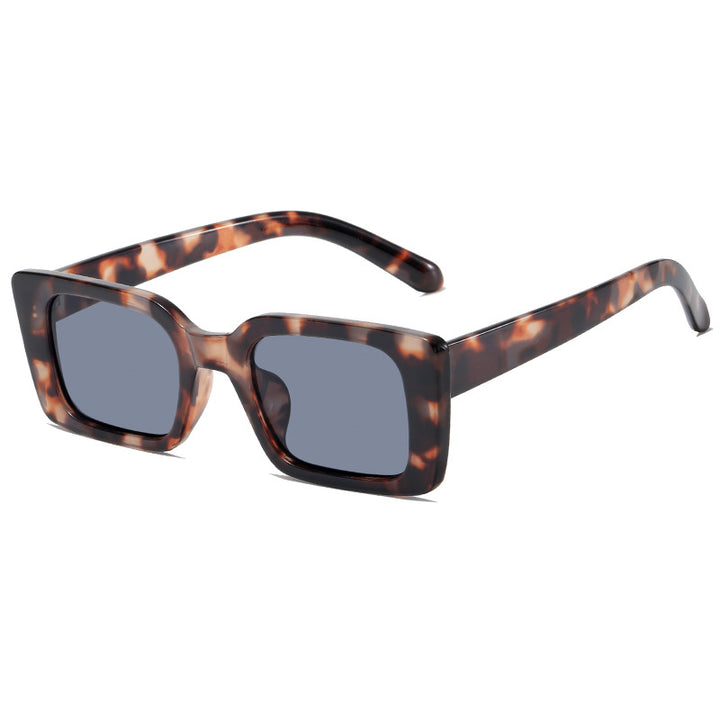 Dame moteriktig kvadratisk solbrille med bred, blank ramme Luvikno