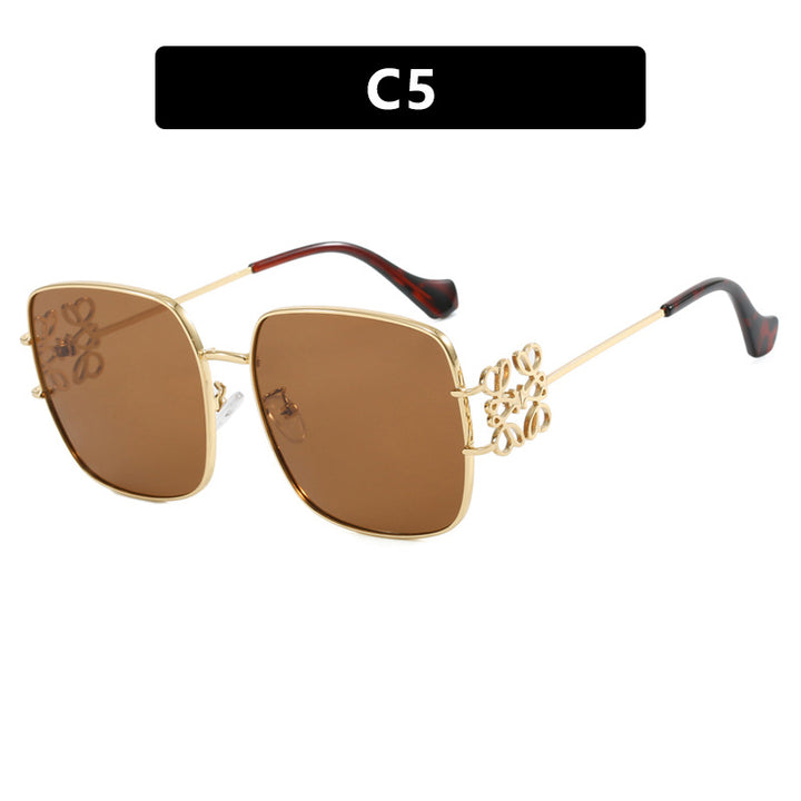 Dame kvadratisk solbrille med filigran design og luksuriøs metallramme Luvikno