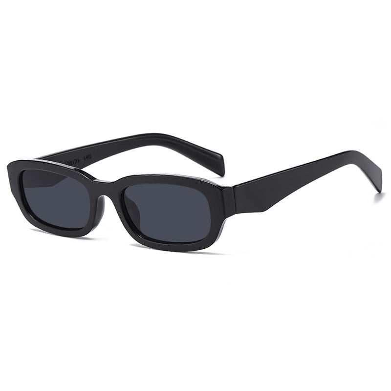 Dame moteriktig solbrille med stilfull, rektangulær ramme Luvikno