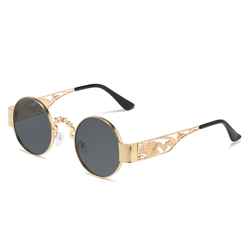 Dame kunstnerisk rundt solbrille med elegant filigranramme Luvikno