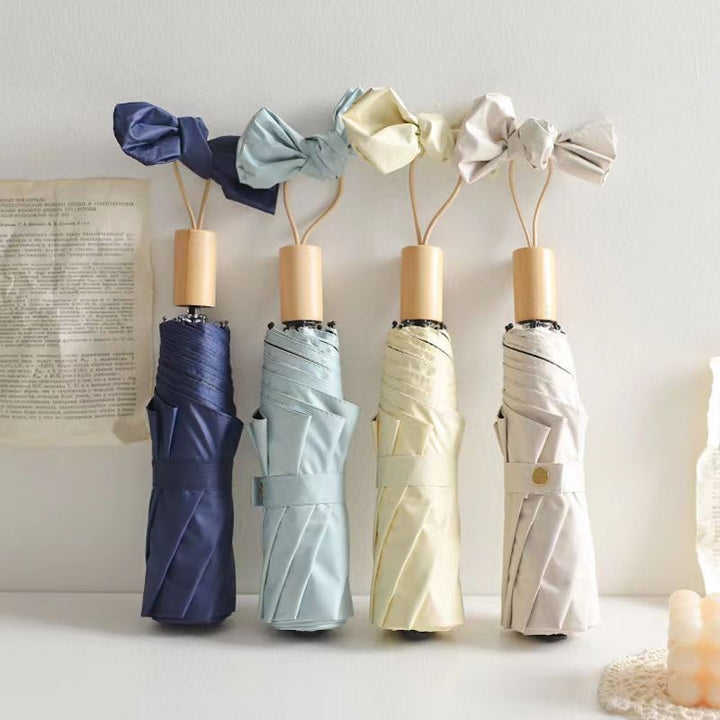 Dame elegant klappparaply med innovativ design Luvikno