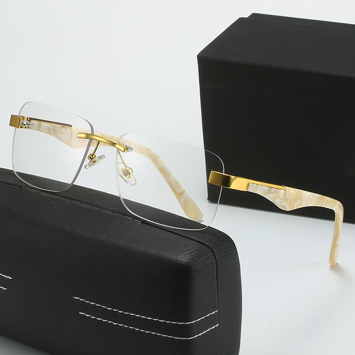 Dame moteriktig halvrammebrille med elegant metall- og plastmix Luvikno