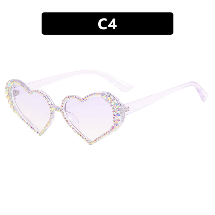 Dame hjerteformet solbrille med strassbesatt ramme Luvikno
