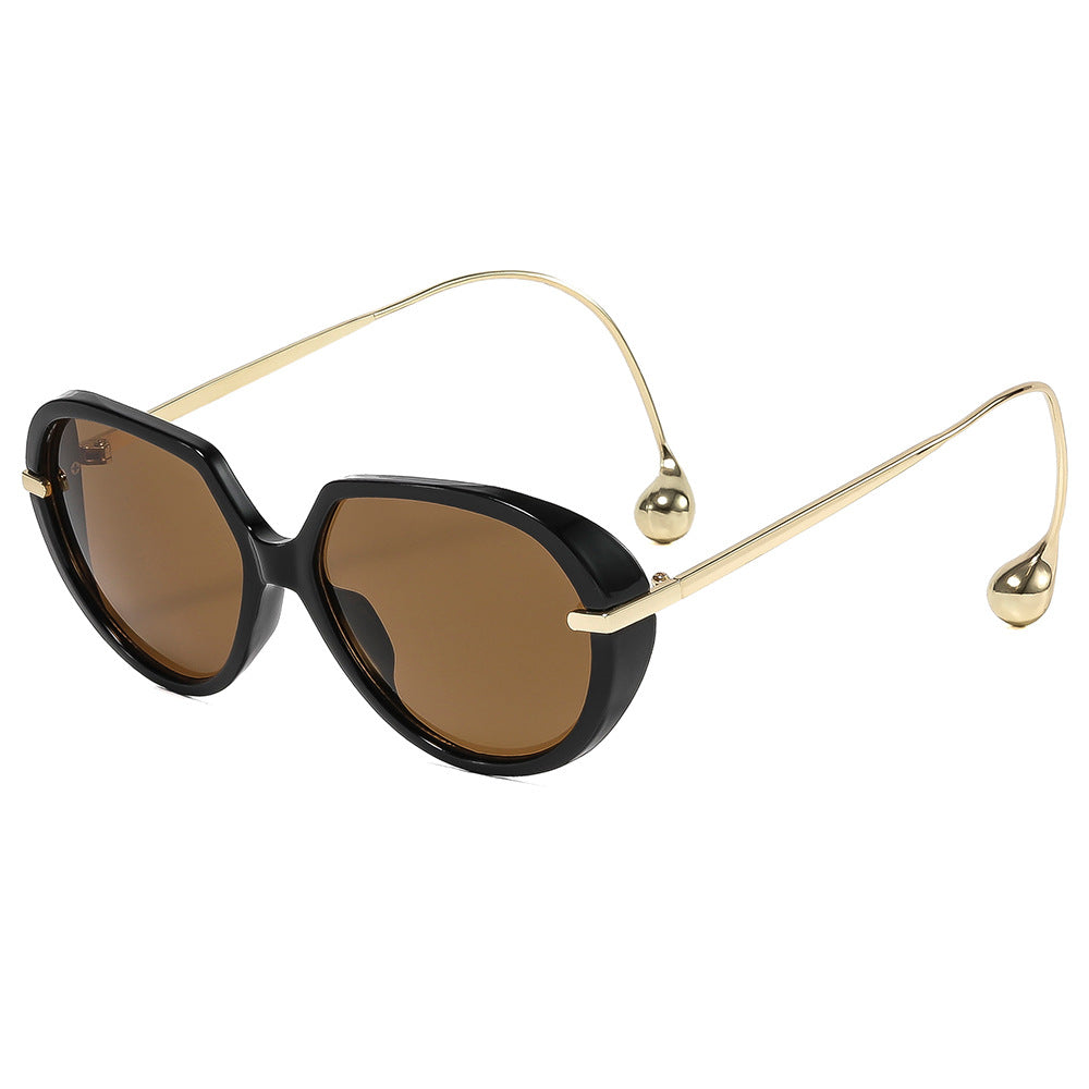 Dame cat-eye solbriller med gyldne detaljer og stilig ramme Luvikno