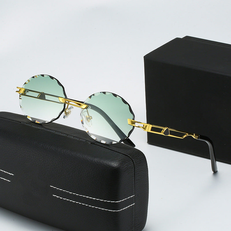 Dame rund solbrille med unikt bølgedesign og høykvalitets metallramme Luvikno