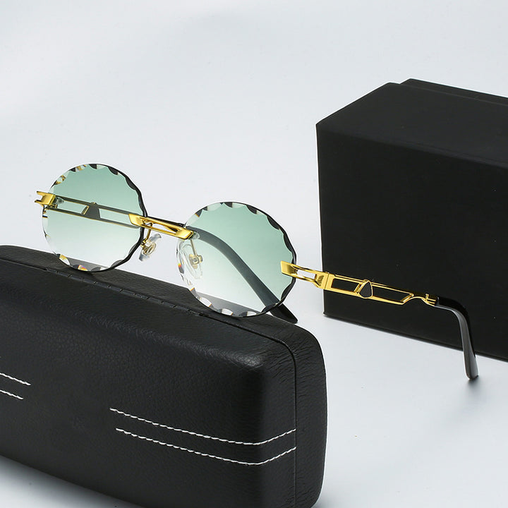 Dame rund solbrille med unikt bølgedesign og høykvalitets metallramme Luvikno