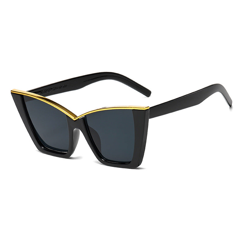 Dame ekstravagant solbrille med unik design og gullige aksenter Luvikno