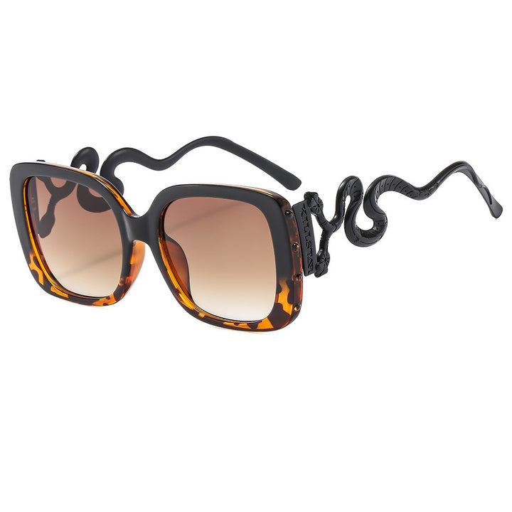 Dame ekstravagant designer solbrille med luksuriøs slangeramme Luvikno