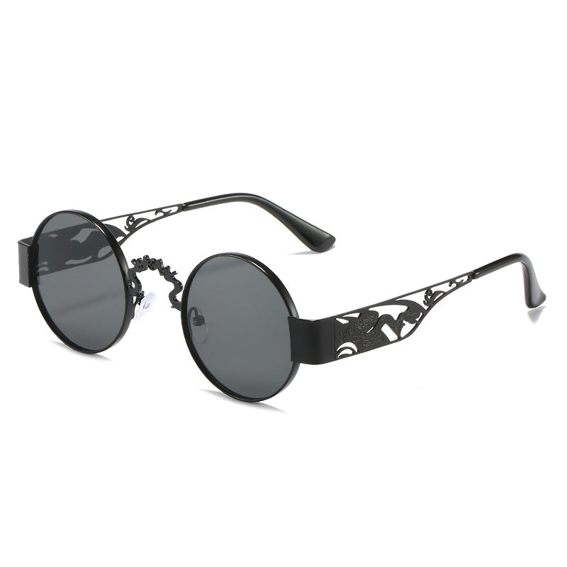 Dame kunstnerisk rundt solbrille med elegant filigranramme Luvikno