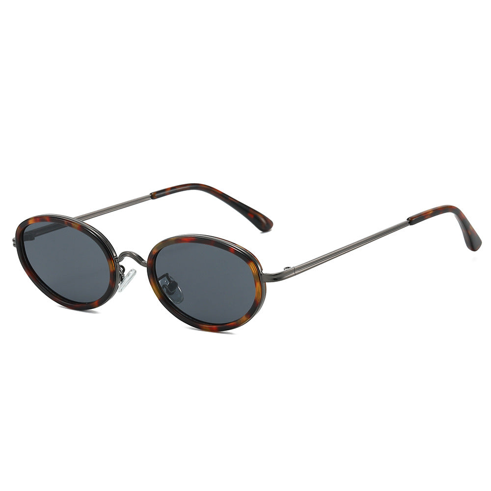 Dame moteriktig solbrille med høy kvalitet ramme og runde glass Luvikno