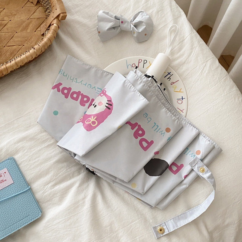 Dame Faltregnparaply med kreativt tegneserie-design Luvikno