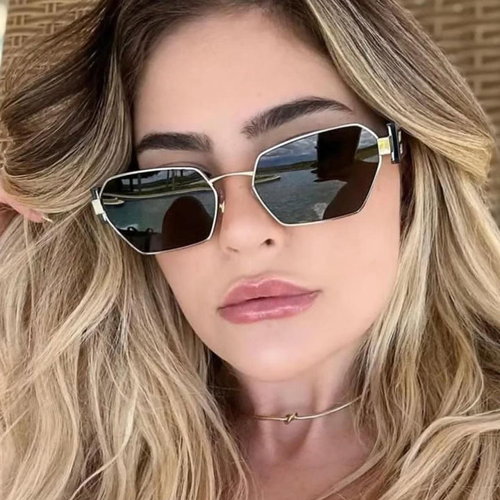 Dame heksagonal solbrille med elegant metallramme og beskyttende glass Luvikno