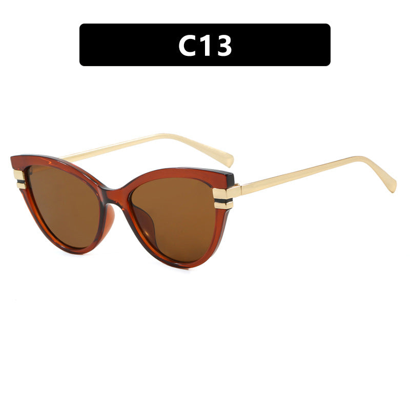 Dame Cat-Eye solbriller med elegant plastramme og gullaccentuer Luvikno