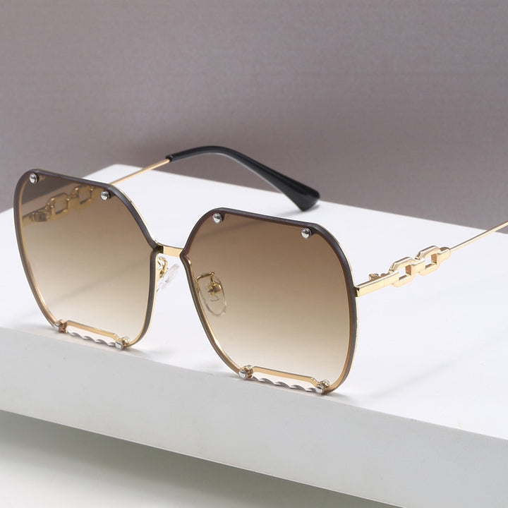 Dame elegant sekskantet designer-solbrille med luksuriøse aksenter Luvikno