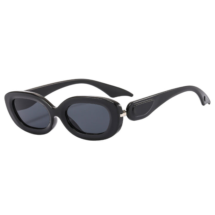 Dame moteriktig solbrille med stilfull buet ramme Luvikno