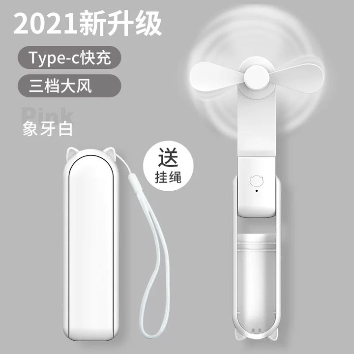 Unisex en størrelse sammenleggbar oppladbar trippel håndholdt mini vifte med innebygd powerbank USB-C og USB-A tilkoblinger samt håndleddsstropp Luvikno