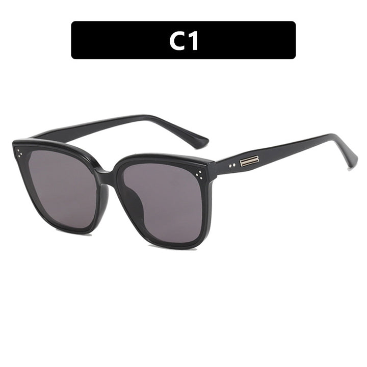 Dame moderne oversized solbrille med elegant, bred ramme Luvikno