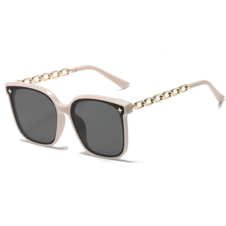 Dame ekstrastor solbrille med modig kjedeinnramming Luvikno