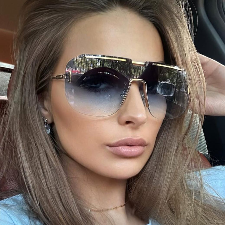 Dame geometrisk solbrille med stilramme i metall og UV-beskyttelse Luvikno