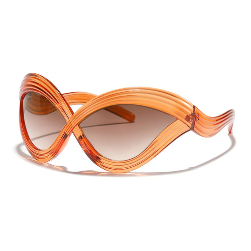 Dame moteriktig solbrille med innovativ bølkeramme Luvikno