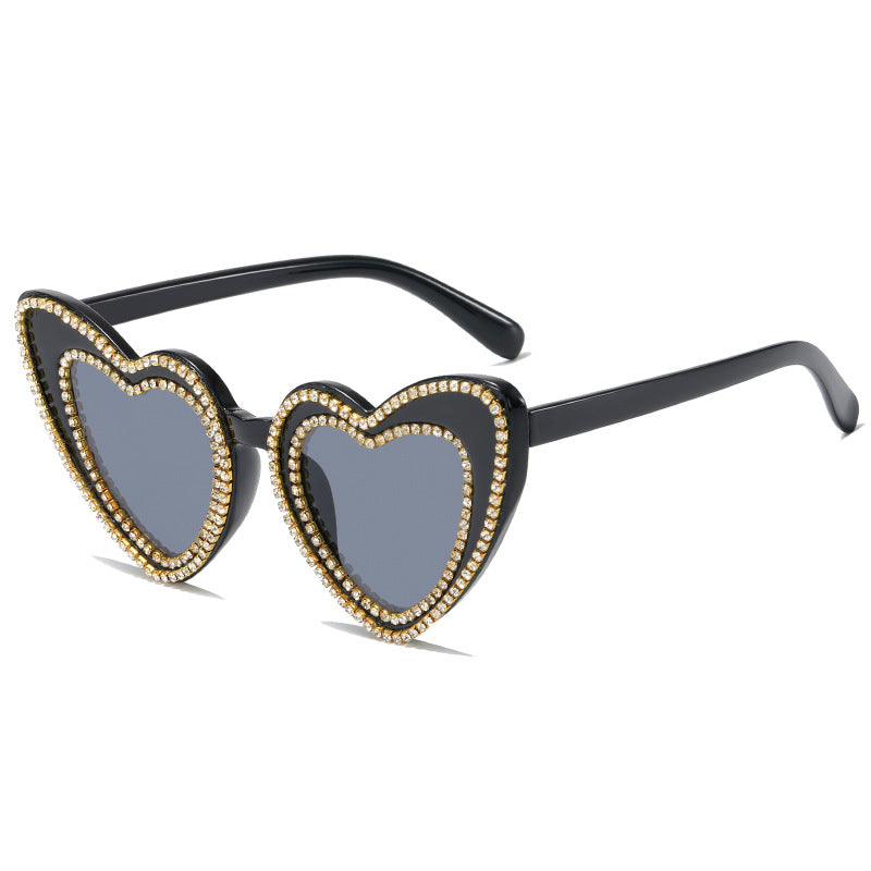 Dame hjerteformet solbrille med glitrende detaljer Luvikno