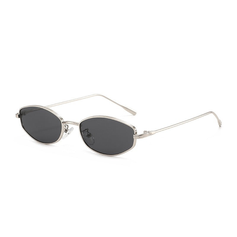 Dame moteriktig solbrille i minimalistisk ovalt design Luvikno