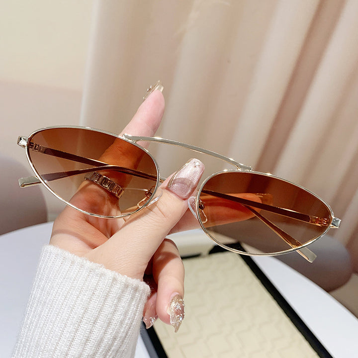 Dame modische solbrille i elegant ovaldesign Luvikno